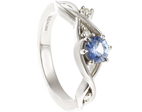23345-white-gold-engagement-ring-with-cornflower-blue-sapphire-and-moissanites_1.jpg