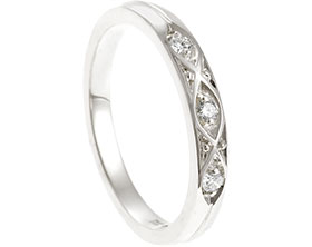 23672-fairtrade-white-gold-and-diamond-eternity-ring-with-grain-detailing_1.jpg