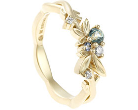 22172-fairtrade-yellow-gold-floral-eternity-ring-with-diamonds-blue-and-teal-sapphires_1.jpg