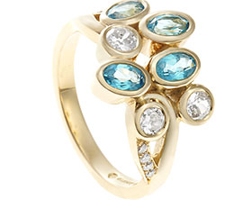 23581-yellow-gold-dress-ring-with-oval-blue-topaz-and-various-diamonds_1.jpg