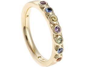 21955-yellow-gold-eternity-ring-with-mixed-coloured-gemstones_1.jpg