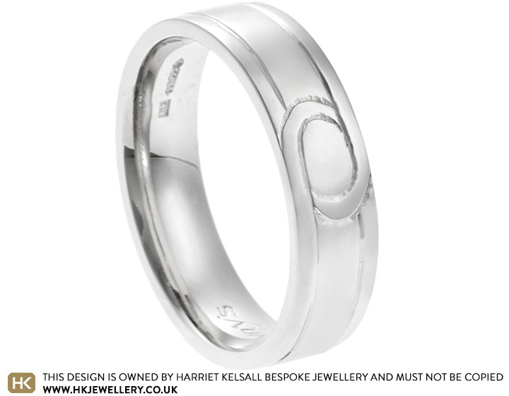 James' platinum wedding ring with outside and inside engraving