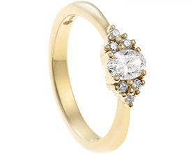23511-yellow-gold-engagement-ring-with-oval-cut-diamond-and-diamond-clusters_1.jpg