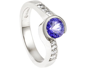 23847-white-gold-dress-ring-with-diamonds-and-round-cut-tanzanite_1.jpg