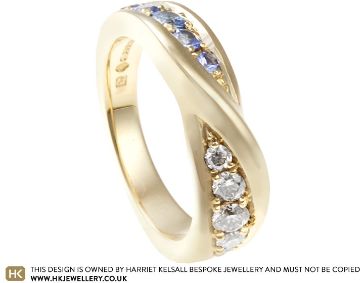 Ellie's Fairtrade 9ct yellow gold cognac diamond and pale blue sapphire eternity ring