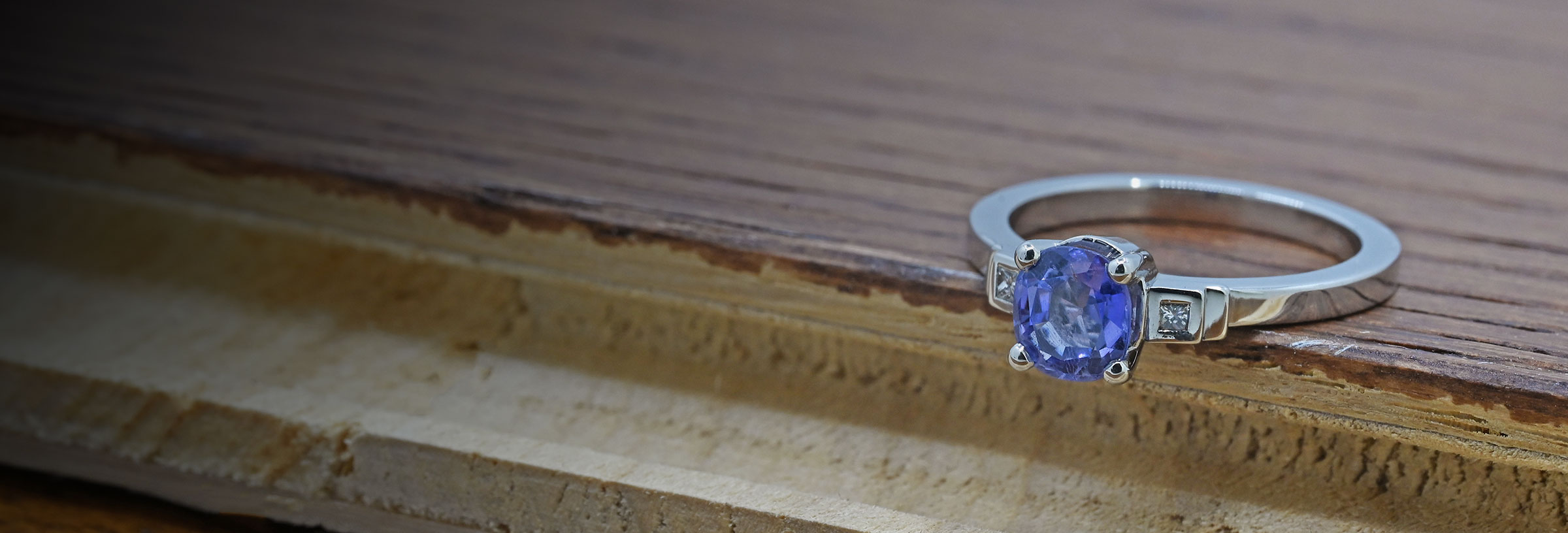 platinum-diamond-and-lilac-sapphire-trilogy-engagement-ring