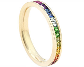 24151-yellow-gold-eternity-ring-with-rainbow-coloured-gemstones_1.jpg