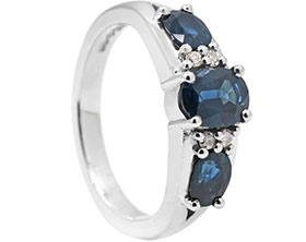 24687-platinum-eternity-ring-with-blue-sapphires-and-diamond_1.jpg