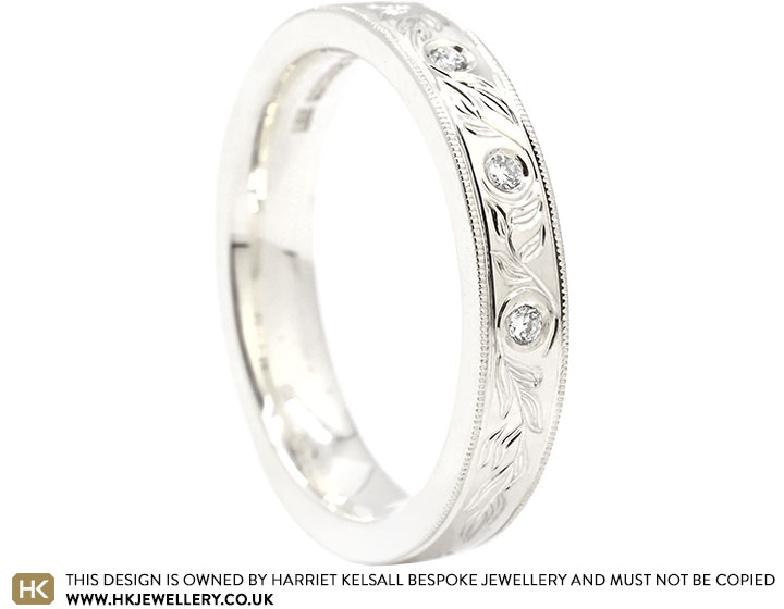 24457-fairtrade-white-gold-eternity-ring-with-diamonds-and-olive-leaf-engraving_2.jpg