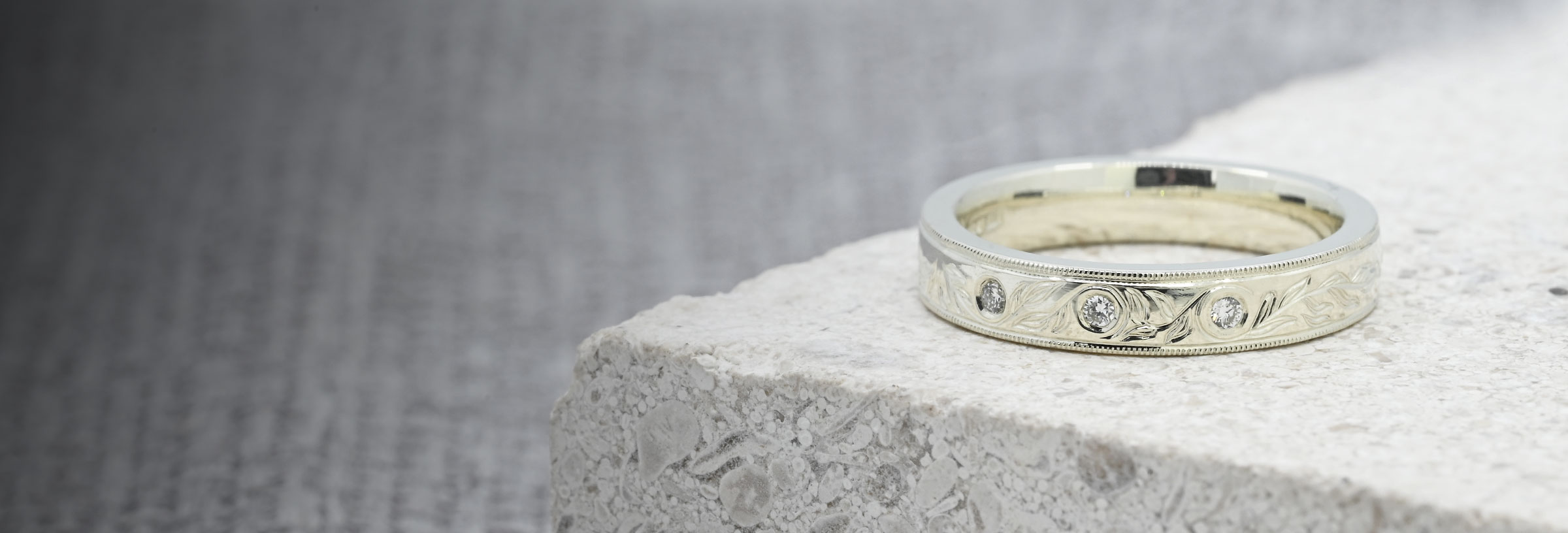 fairtrade-white-gold-eternity-ring-with-diamonds-and-olive-leaf-engraving