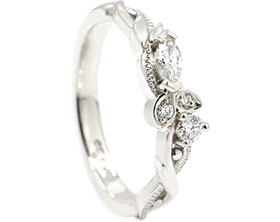 24890-white-gold-floral-marquise-and-brilliant-cut-diamond-eternity-ring_1.jpg