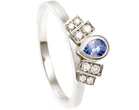 24311-white-gold-commitment-ring-with-pear-cut-sapphire-and-diamonds_1.jpg