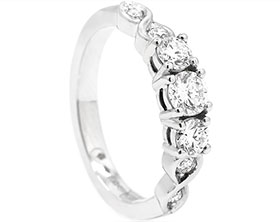 24579-platinum-engagement-ring-with-mixed-sized-diamonds_1.jpg