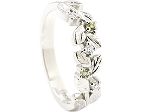 24585-fairtrade-white-gold-eternity-ring-with-green-sapphires-and-diamonds_1.jpg