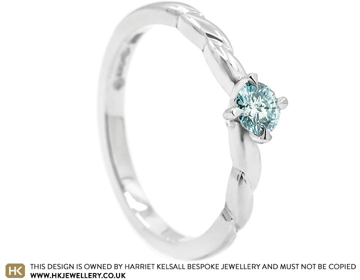 Ami's Platinum and Ice Blue Diamond Twisted Engagement Ring