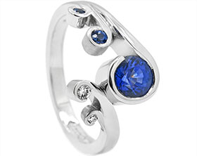 24697-platinum-wave-inspired-eternity-ring-with-sapphires-and-diamonds_1.jpg