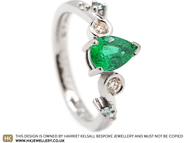 Rachel's Fairtrade18ct White Gold Emerald and Diamond Curl Engagement Ring