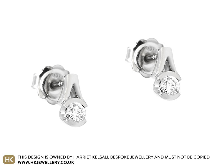 Sandra's Unique Diamond and Platinum Stud Earrings