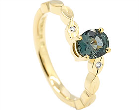 25379-fairtrade-yellow-gold-shaped-engagement-ring-with-teal-sapphire-and-diamonds_1.jpg
