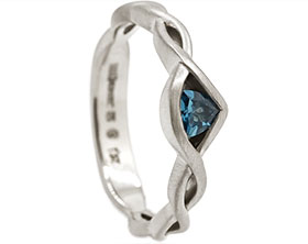 25404-satinised-fairtrade-white-gold-engagement-ring-with-trilliant-cut-topaz_1.jpg