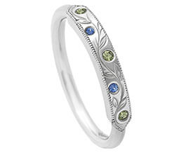 platinum-eternity-ring-with-green-and-blue-sapphires-and-vine-engraving_1.jpg