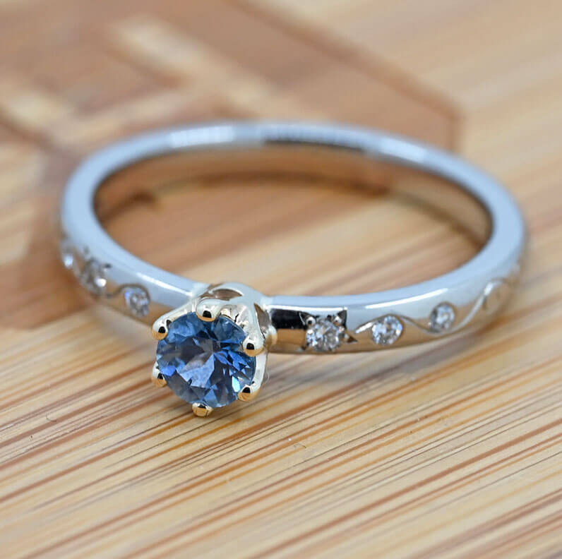 24432-fairtrade-white-and-yellow-gold-forget-me-not-engagement-ring-with-malawi-sapphire_9.jpg