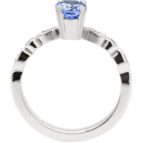 24544-white-gold-engagement-ring-with-diamonds-and-central-tanzanite_3.jpg