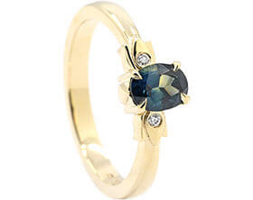 24882-fairtrade-yellow-gold-engagement-ring-with-teal-sapphire-and-diamonds_1.jpg