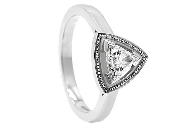 Striking Handmade Platinum Statement Ring with Trilliant Cut Diamond