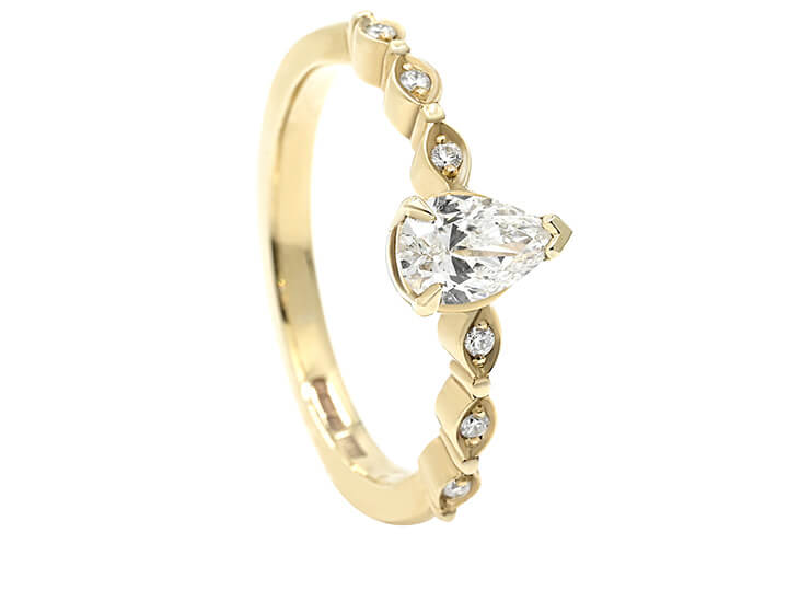 Marquise Shaped Band with Pear Cut Diamond