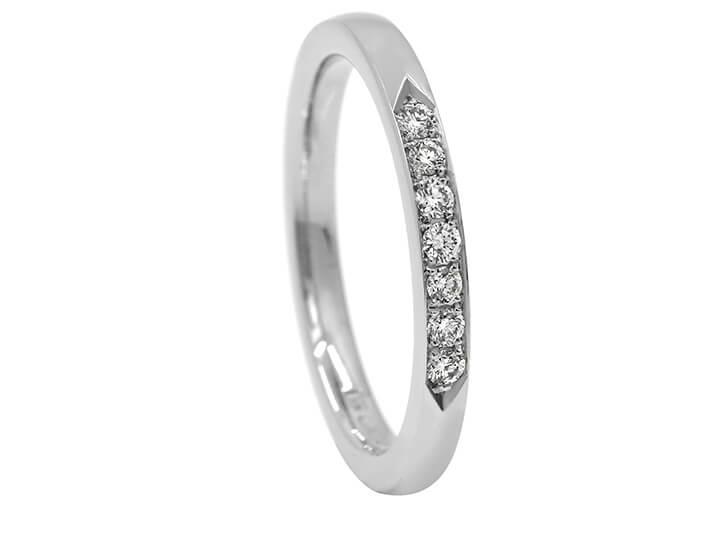 Crisp White Platinum and Seven Glittering Diamonds