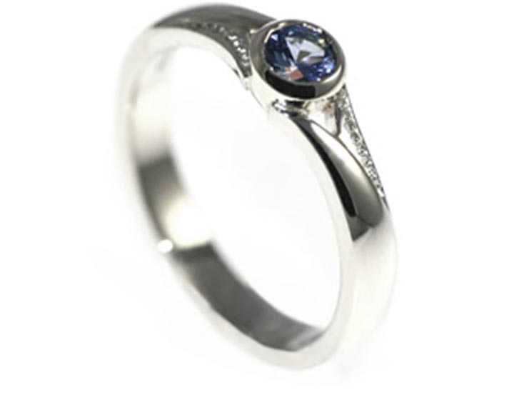 A beautiful waterfall coloured sapphire engagement ring