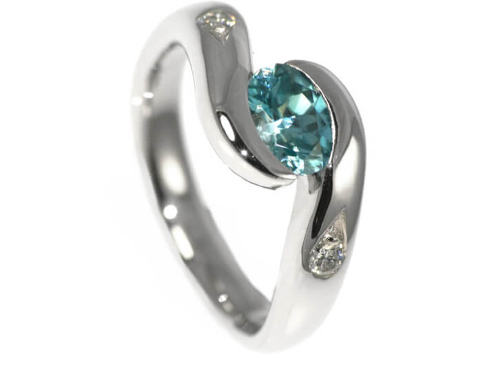 Julie's chunky blue zircon and diamond engagement ring