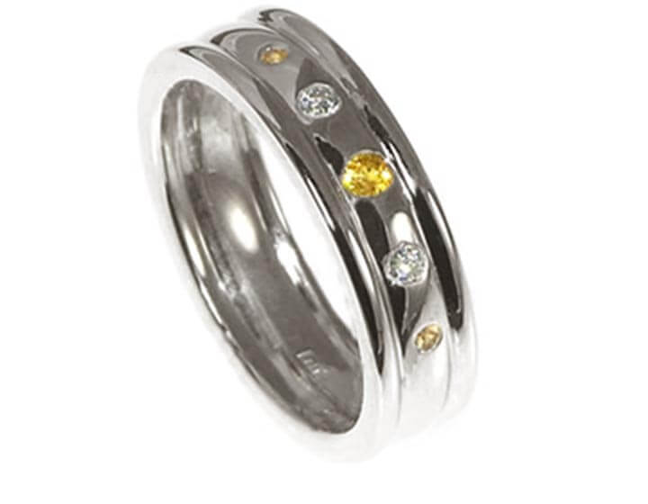 9ct white gold, yellow sapphires and diamond eternity ring in a 3 way split band
