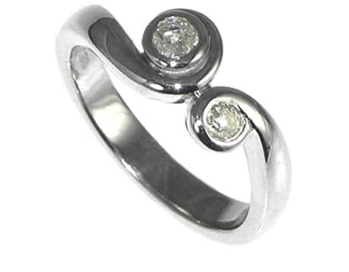 Palladium diamond engagement ring inspired by Nicola's love of the violin.