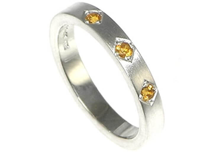 White gold and citrine eternity ring 