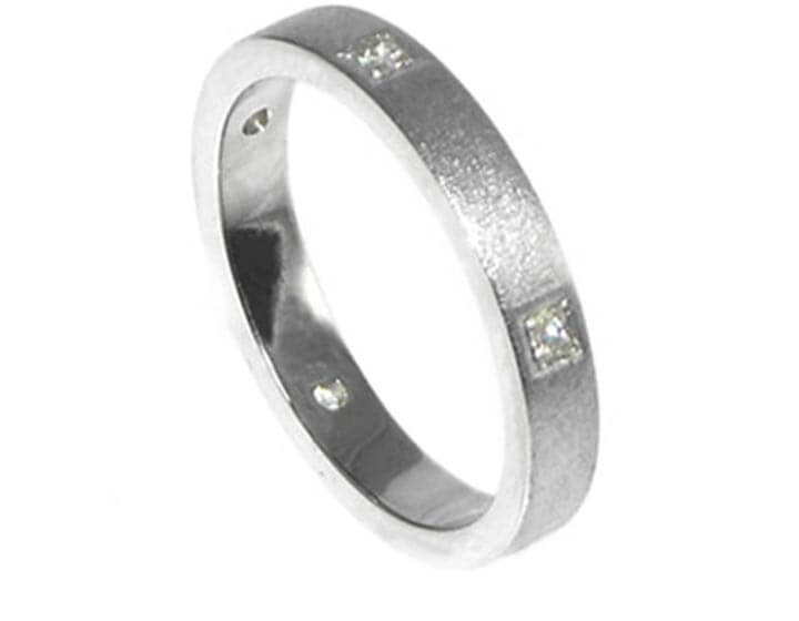 Platinum eternity ring with five brilliant cut diamonds 0.075cts in a square grain setting. 