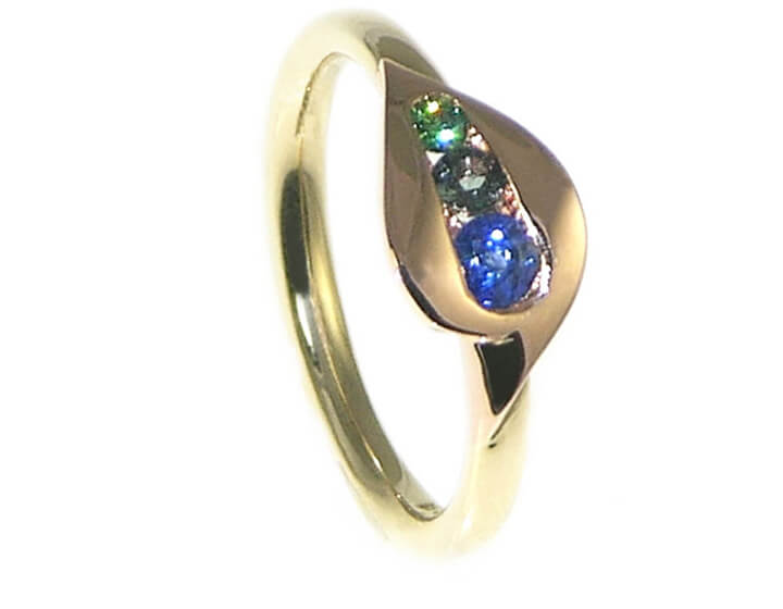 Peacock inspired 9ct rose and yellow gold engagement and wedding ring set