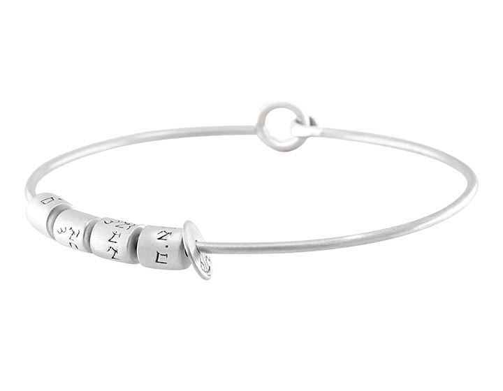 A Sterling Silver Bangle with Sentimental Beads