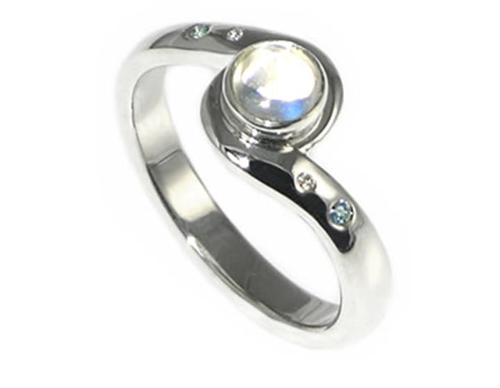 Rachel's 9ct white gold engagement ring with a cabochon moonstone