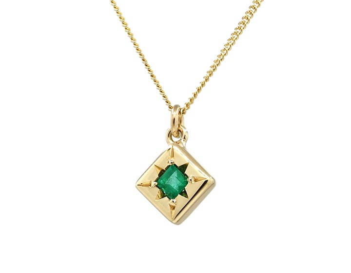 Diane's 9ct Yellow Gold Star-Set Emerald Pendant