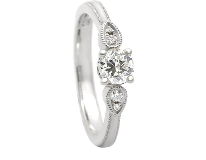 Floral Inspired diamond engagement ring made from Recycled White Gold