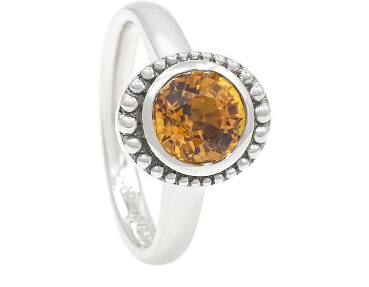 Accentuating Sue's Orange Sapphire