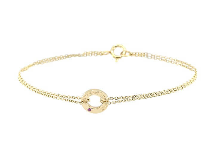 Charm Bracelet with a Pink Sapphire