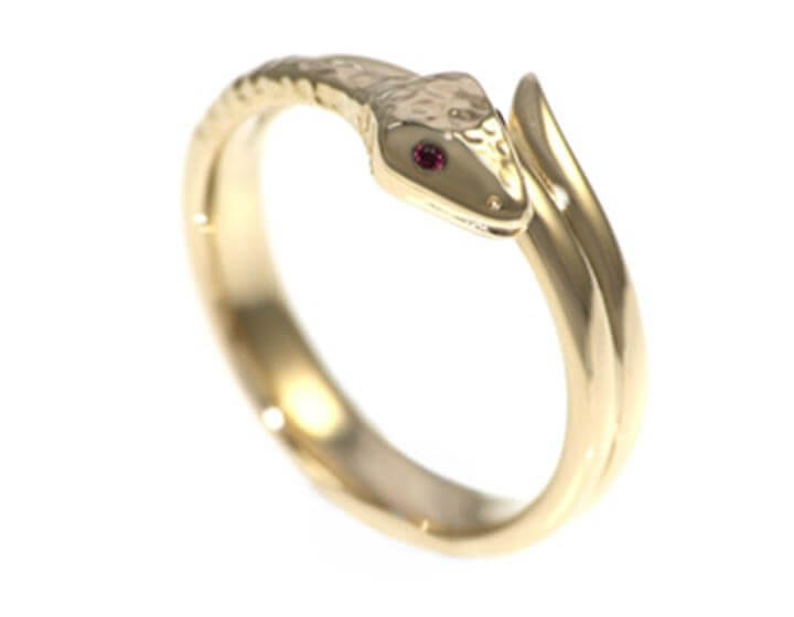 Malcolm's unusual and life-like snake inspired ring with rubies