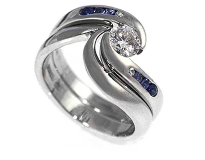 Ruth's palladium fitted wave inspired wedding ring