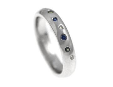 Claire's colourful scatter set platinum ring.