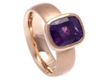 Julia's Fairtrade 9ct rose gold dress ring with a cushion cut sapphire