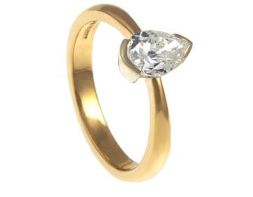 Ian and Alison's stunning mixed metal pear cut diamond ring.