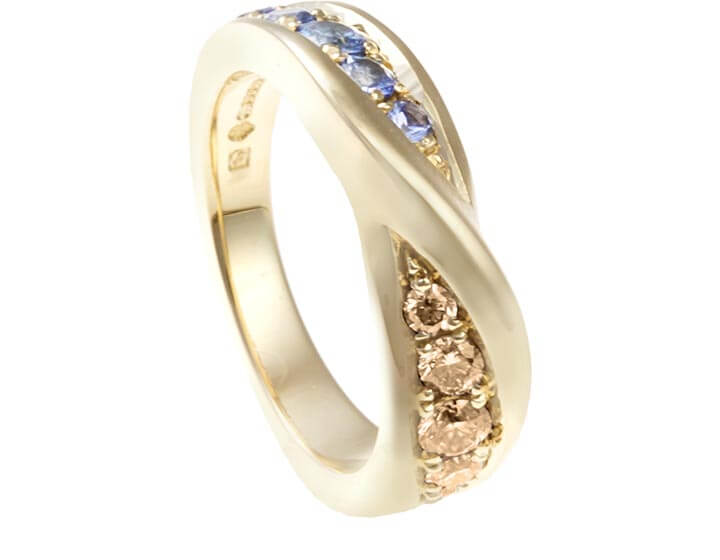 Ellie's Fairtrade 9ct yellow gold cognac diamond and pale blue sapphire eternity ring